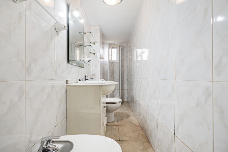 Modern Bathroom with Large Tiles